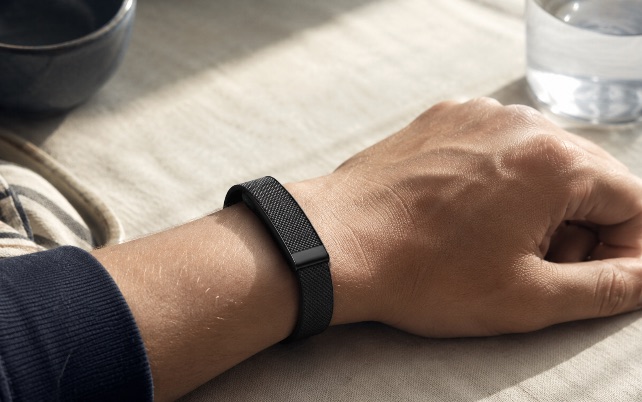 GLP Care band worn on a wrist in morning light